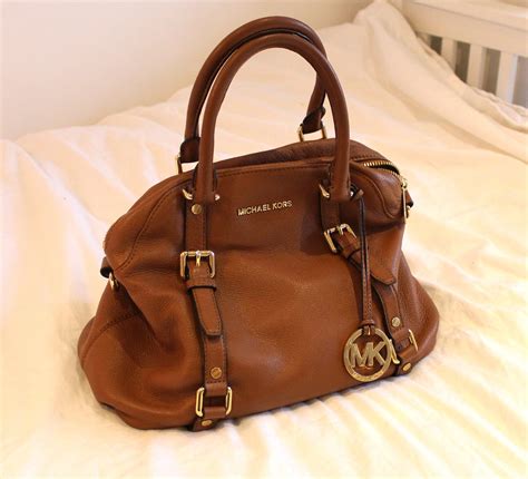 my michael kors bag broke|sell used Michael Kors bag.